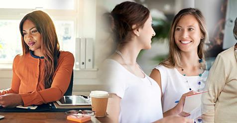 Diverse women collaborating in a modern office setting, celebrating International Women's Day.