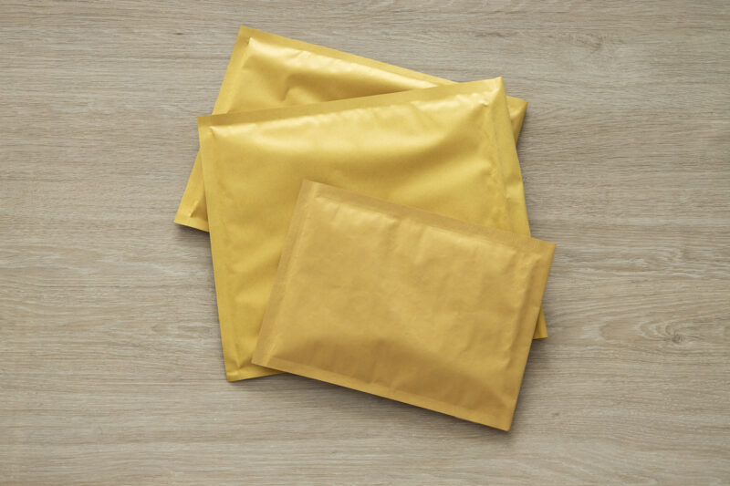Golden padded envelopes from a paper and packaging supplier